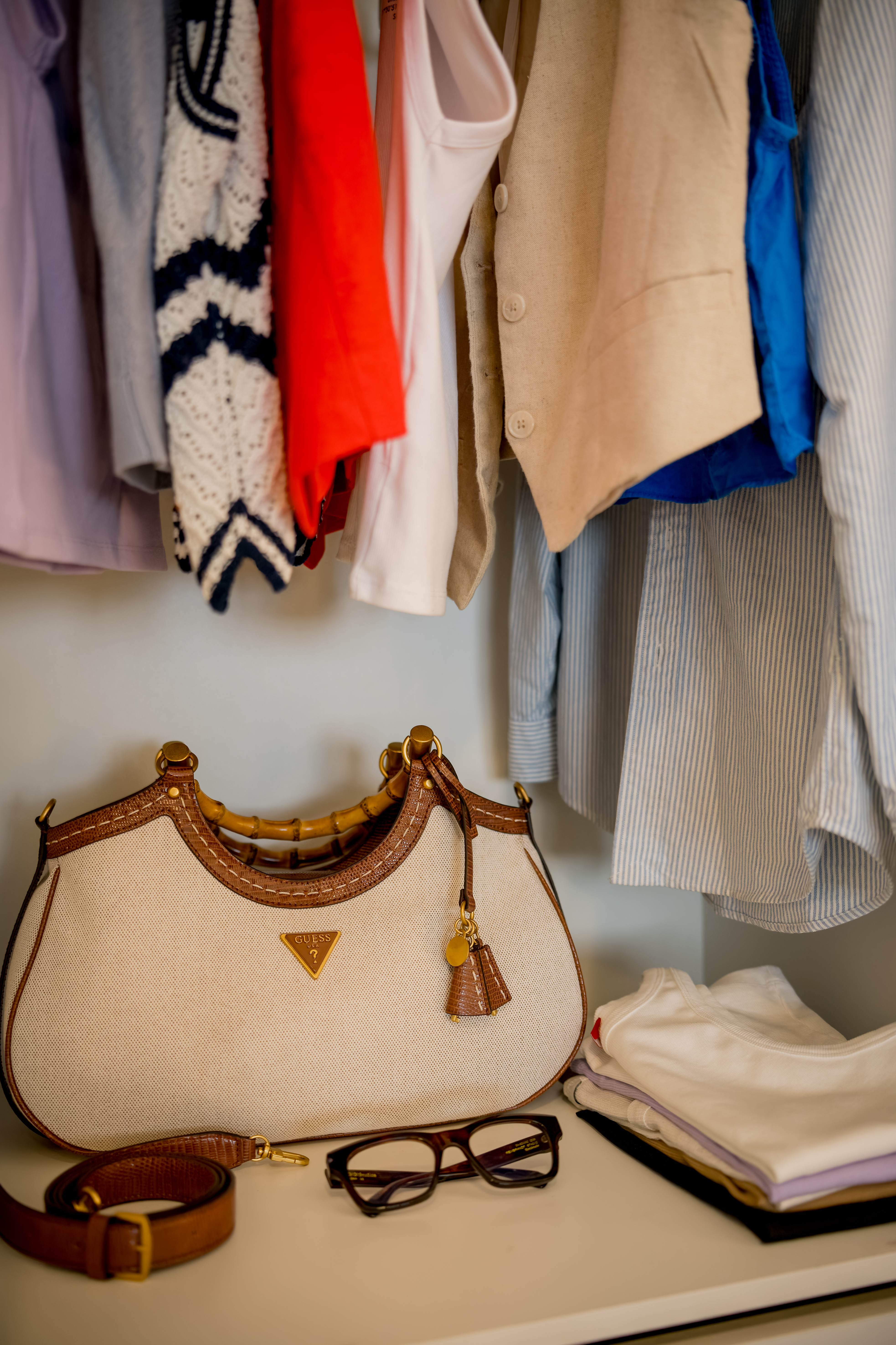 Clothes and accessories in wardrobe